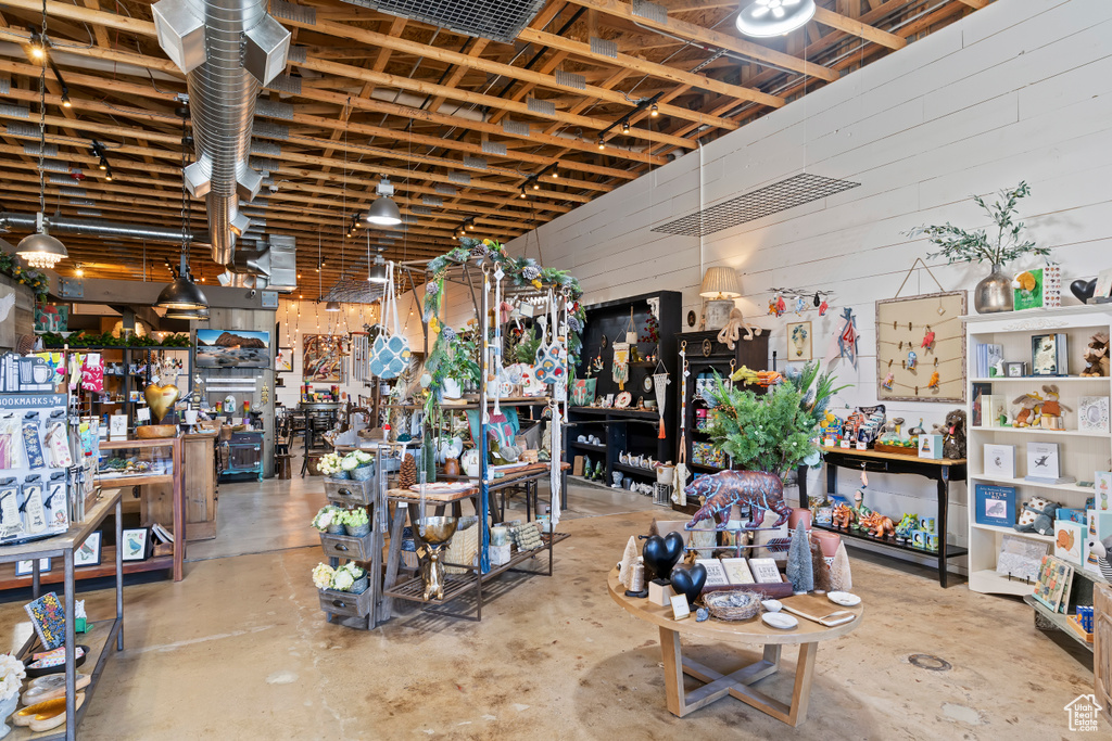 Below grade area featuring wood walls