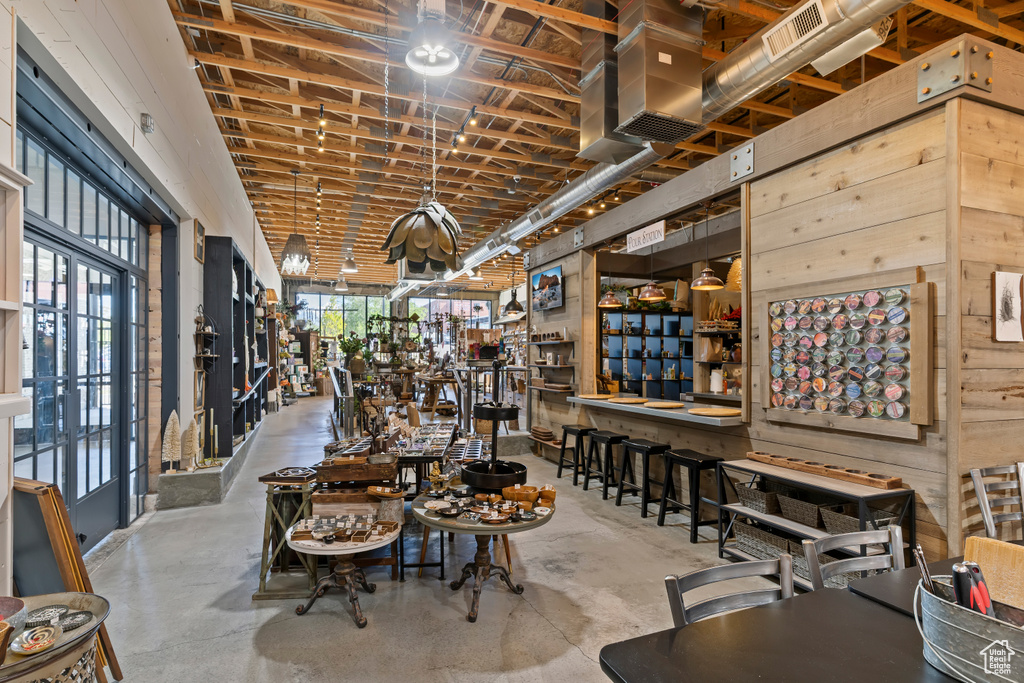 Dining room featuring concrete flooring