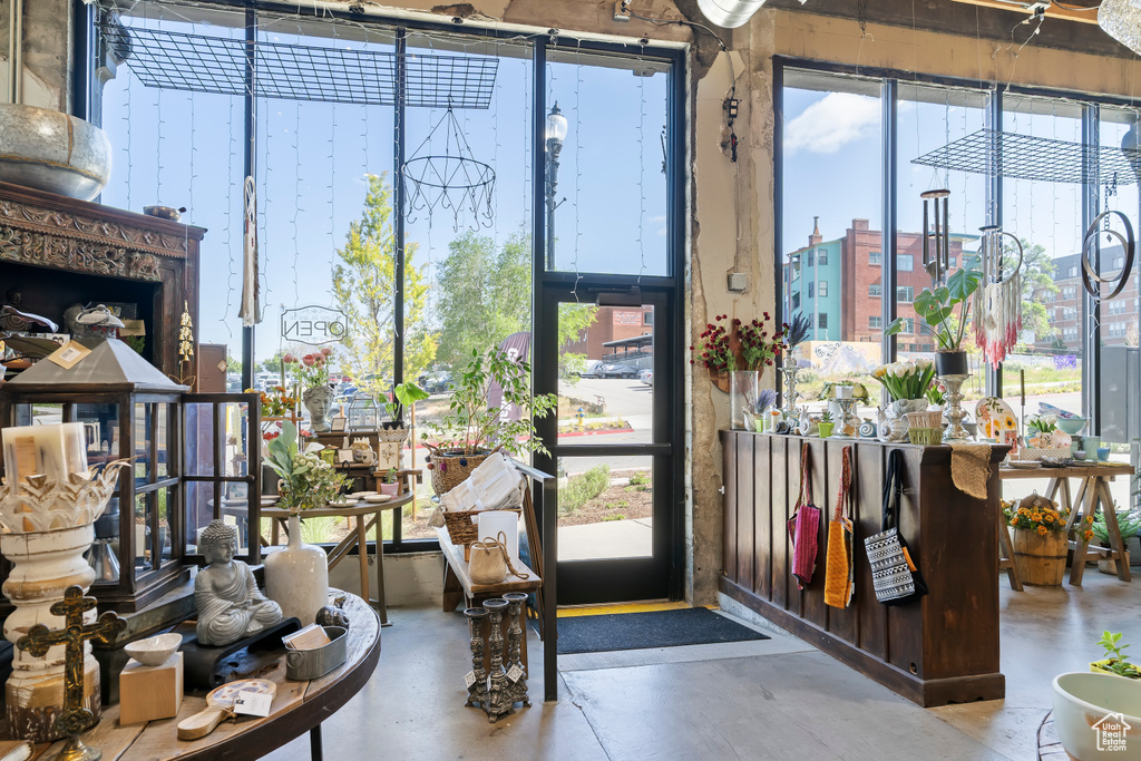 Doorway to outside featuring concrete flooring