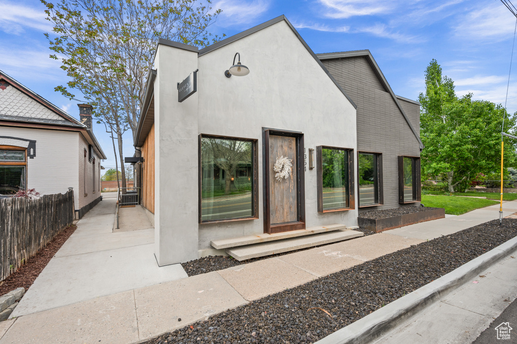 View of front facade with stucco siding