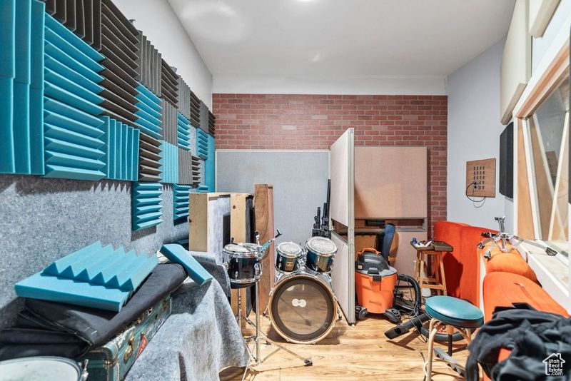 Miscellaneous room featuring wood finished floors