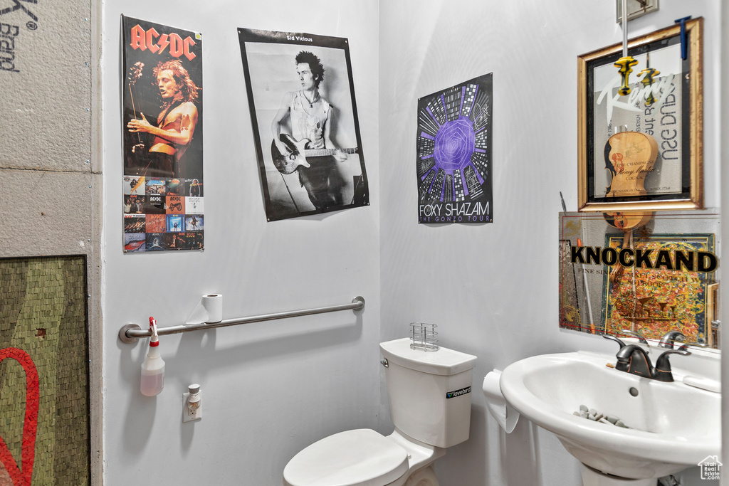 Bathroom featuring toilet and a sink
