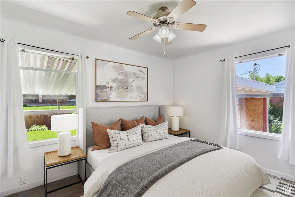 Bedroom featuring baseboards and a ceiling fan