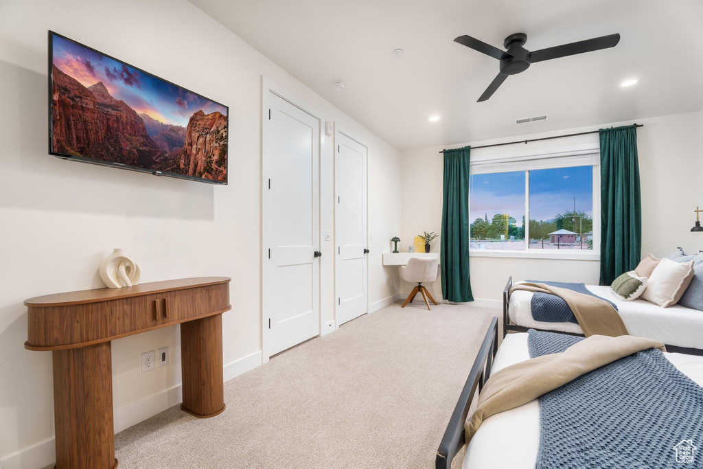 Bedroom with carpet floors, baseboards, recessed lighting, and a ceiling fan