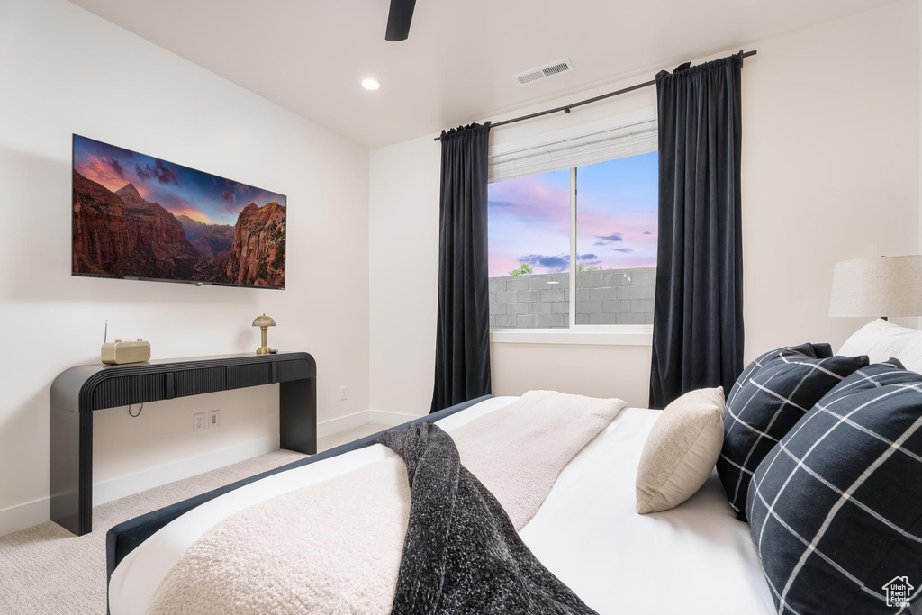 Bedroom with carpet floors, baseboards, recessed lighting, and a ceiling fan