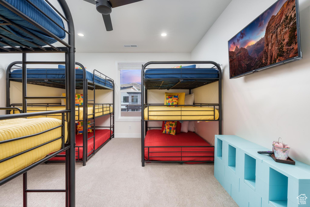 Carpeted bedroom featuring recessed lighting