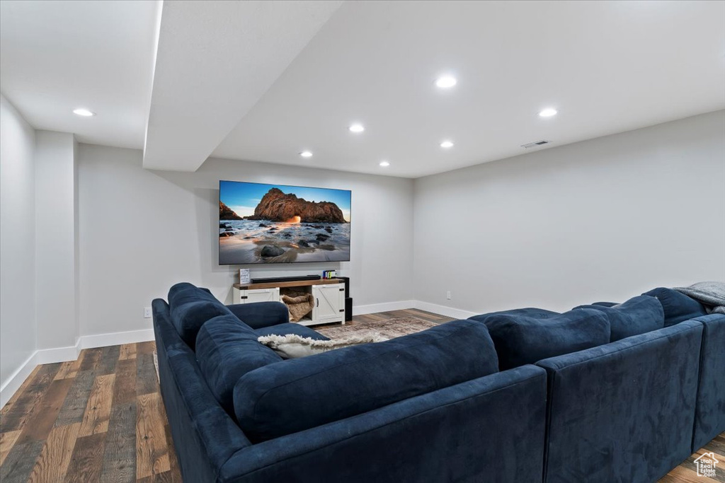 Cinema featuring recessed lighting, baseboards, and wood finished floors