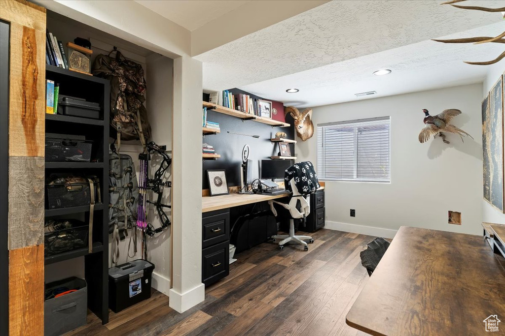 Office with baseboards, dark wood finished floors, a textured ceiling, and recessed lighting