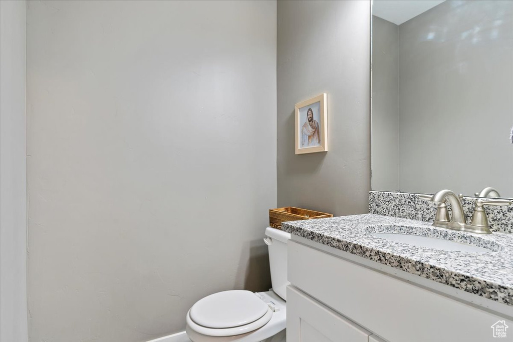 Bathroom with toilet and vanity