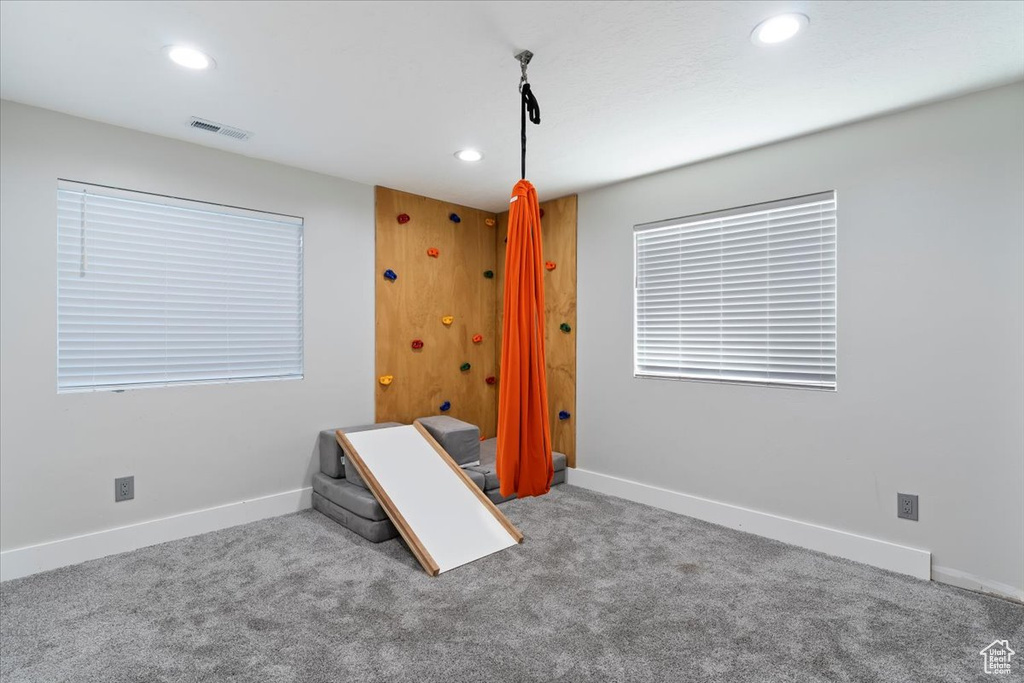 Unfurnished bedroom with recessed lighting, carpet flooring, and baseboards