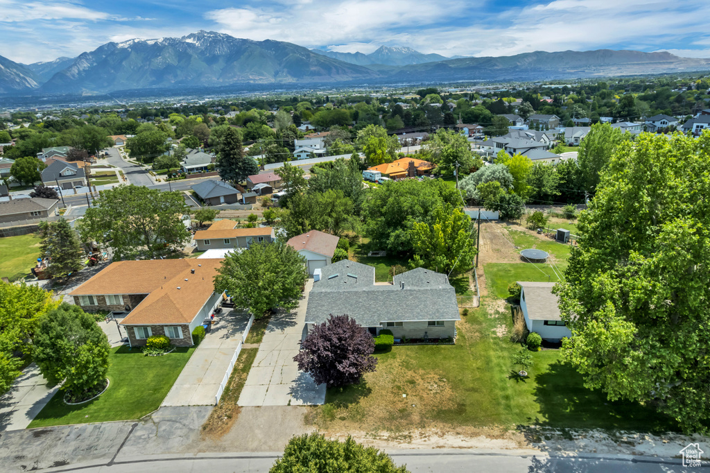 Aerial view of residential area with mountains