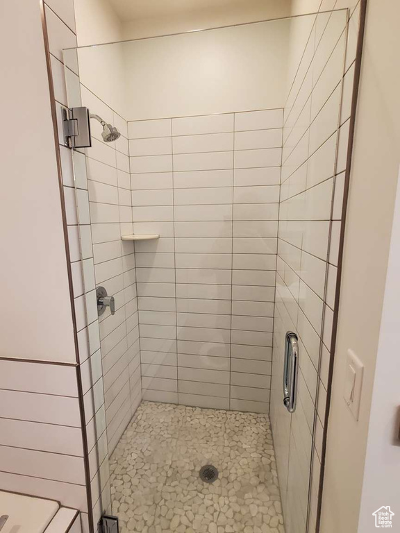 Bathroom with a shower stall
