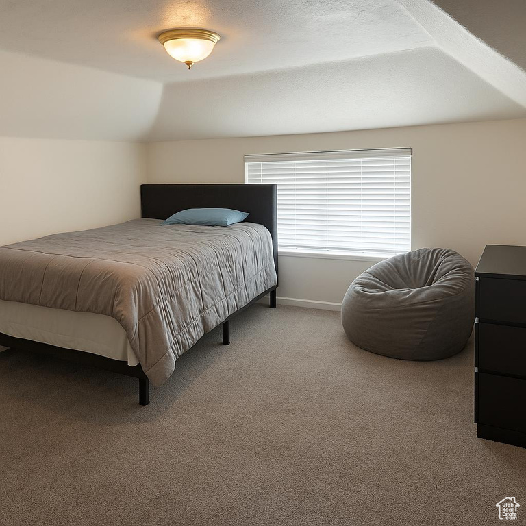 Bedroom with carpet and baseboards