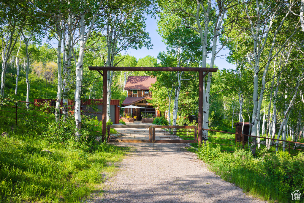 View of property\'s community featuring a gate