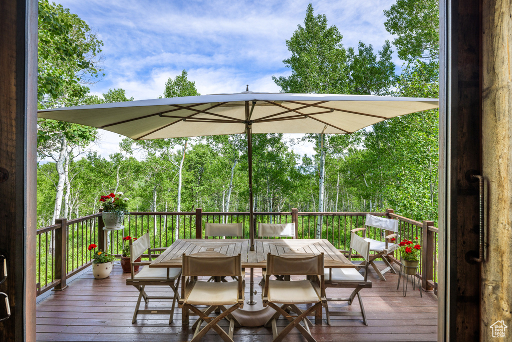 Wooden deck with outdoor dining space
