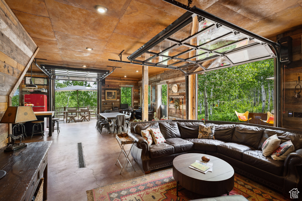 Living area featuring finished concrete floors and healthy amount of natural light