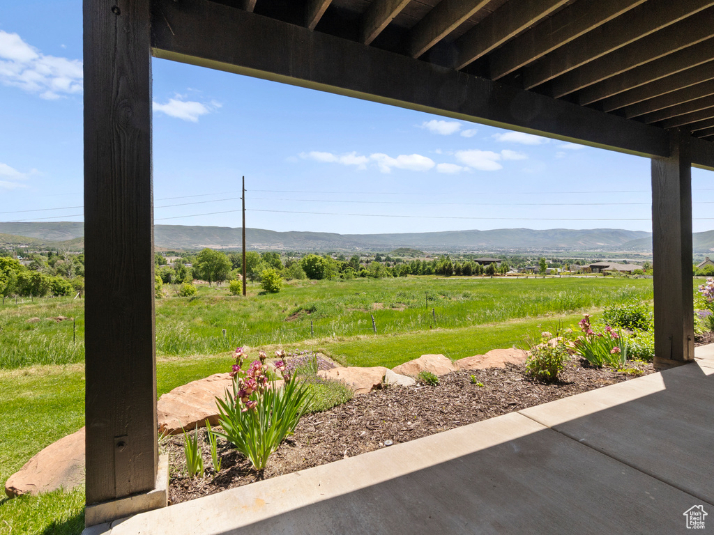 View of yard with a mountain view