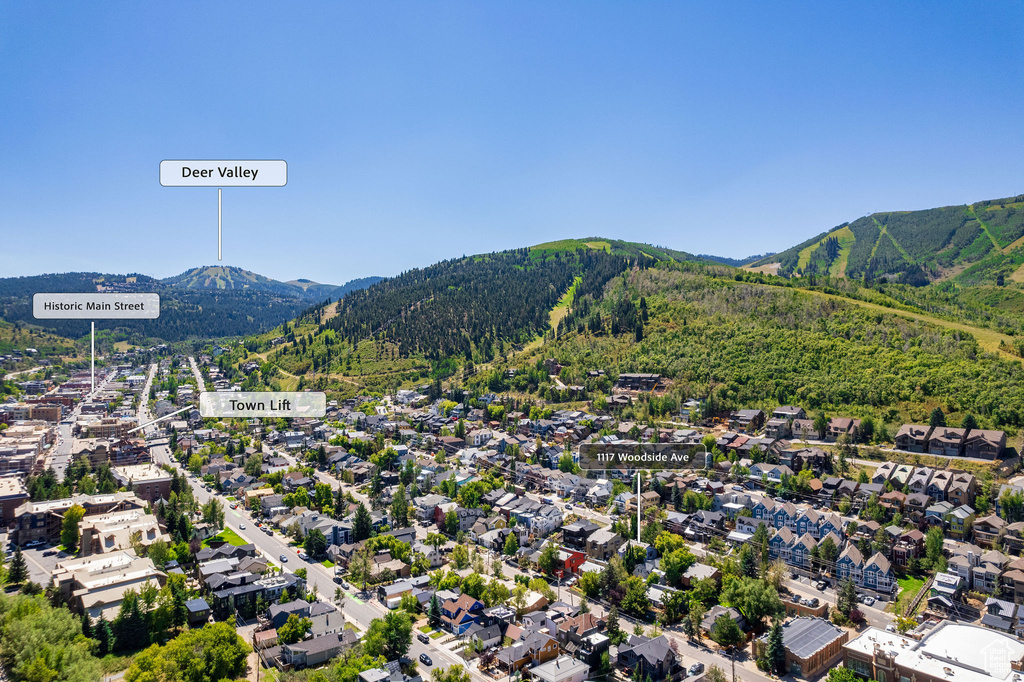 View of mountain background featuring nearby suburban area