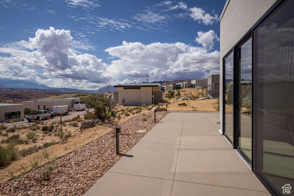 View of patio / terrace with a mountain view