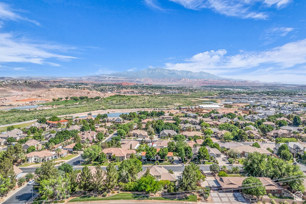 Aerial view of residential area with a mountain backdrop