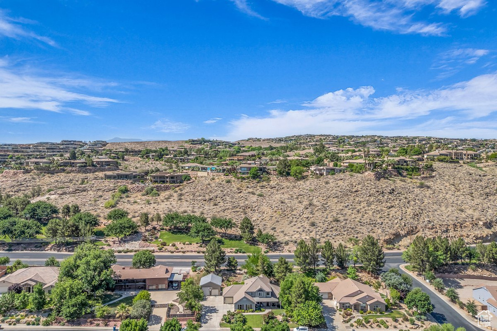 Aerial view of residential area featuring mountains