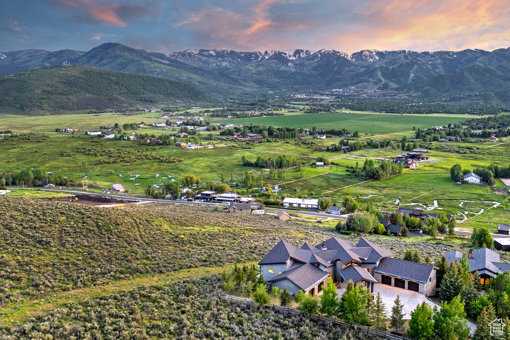 View of mountain backdrop featuring rural landscape
