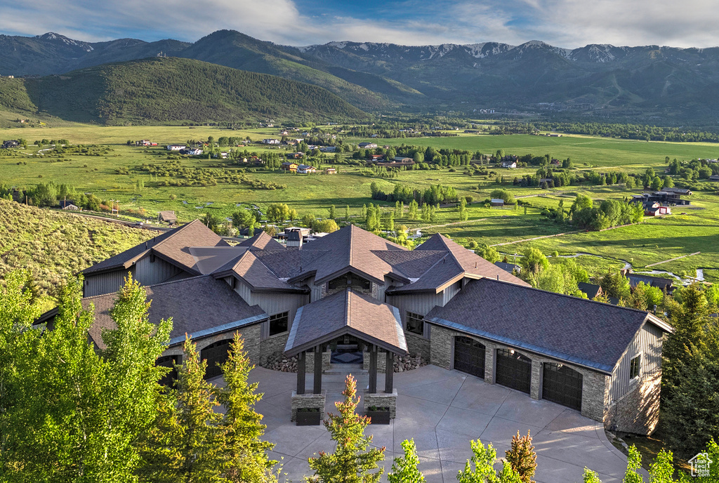 View of subject property with mountains