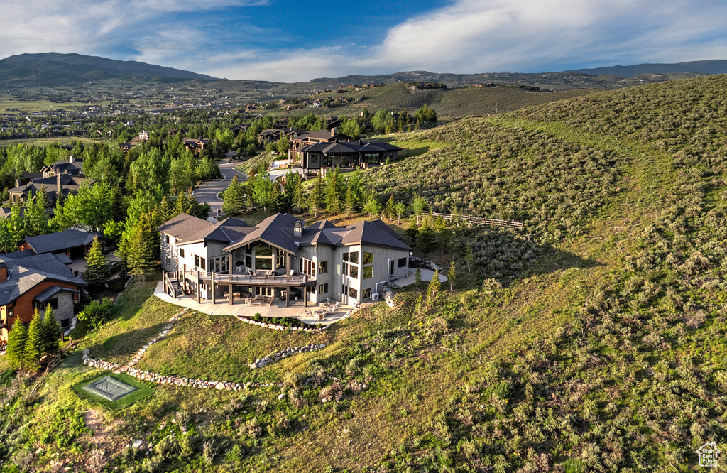 View from above of property featuring a mountainous background