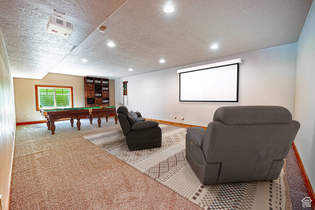 Cinema room featuring a textured ceiling, billiards table, baseboards, recessed lighting, and carpet floors