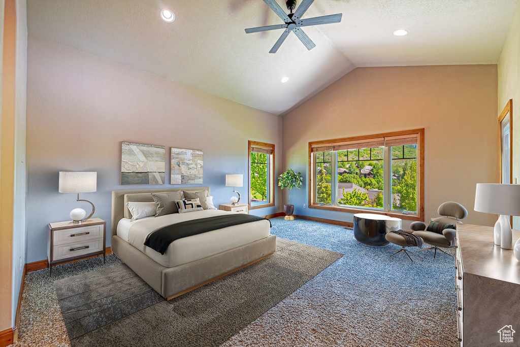 Carpeted bedroom featuring baseboards, high vaulted ceiling, recessed lighting, and a ceiling fan