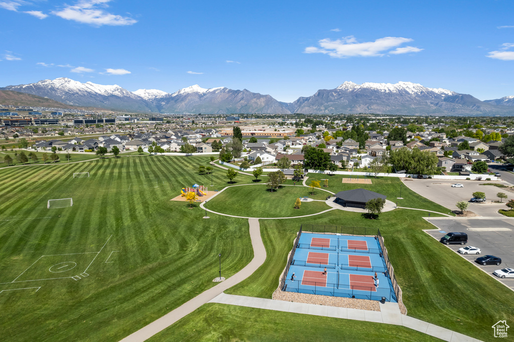Surrounding community with a mountain view and a residential view