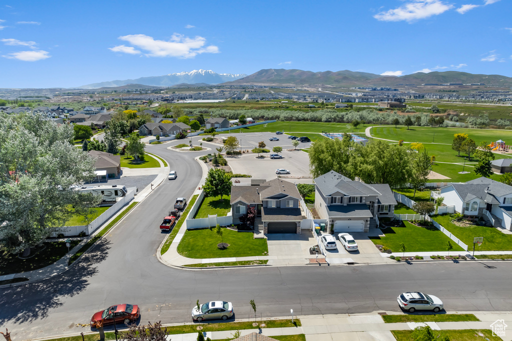 Aerial view of residential area featuring mountains