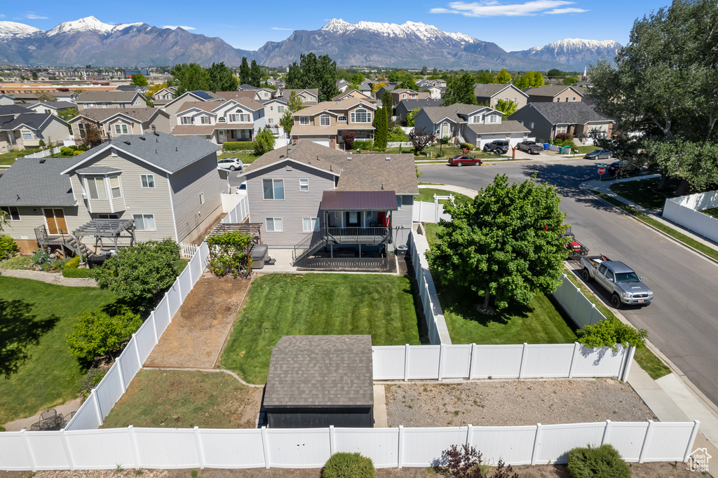 Aerial view of residential area with a mountainous background