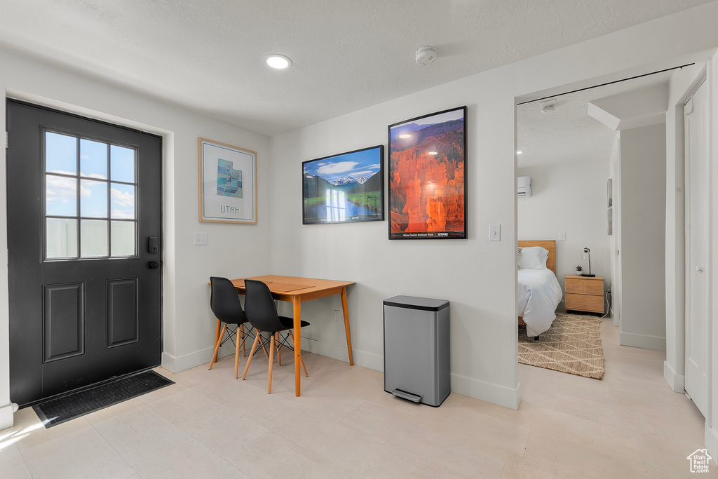 Office with baseboards and recessed lighting