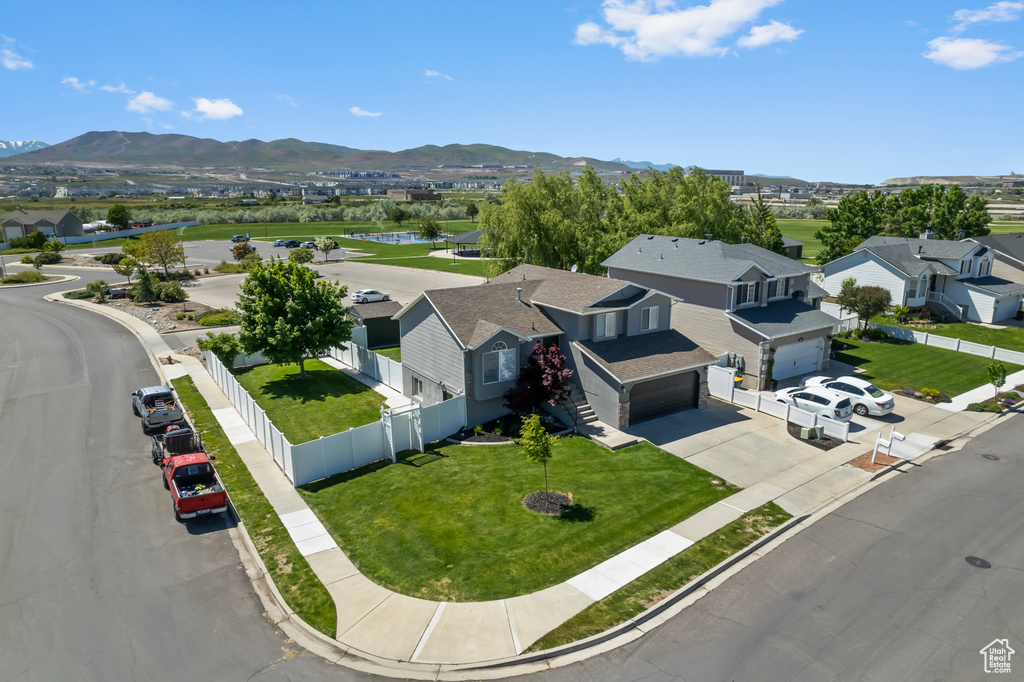 Aerial view of residential area with a water and mountain view