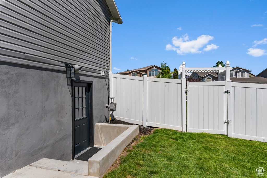 View of yard with a gate