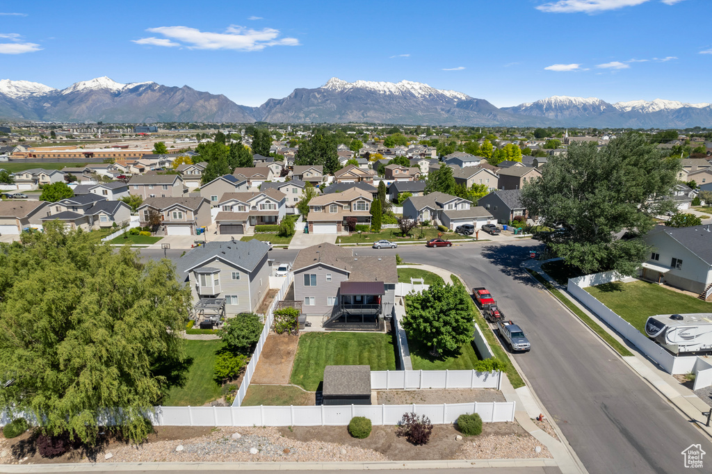 Aerial view of residential area with a mountainous background