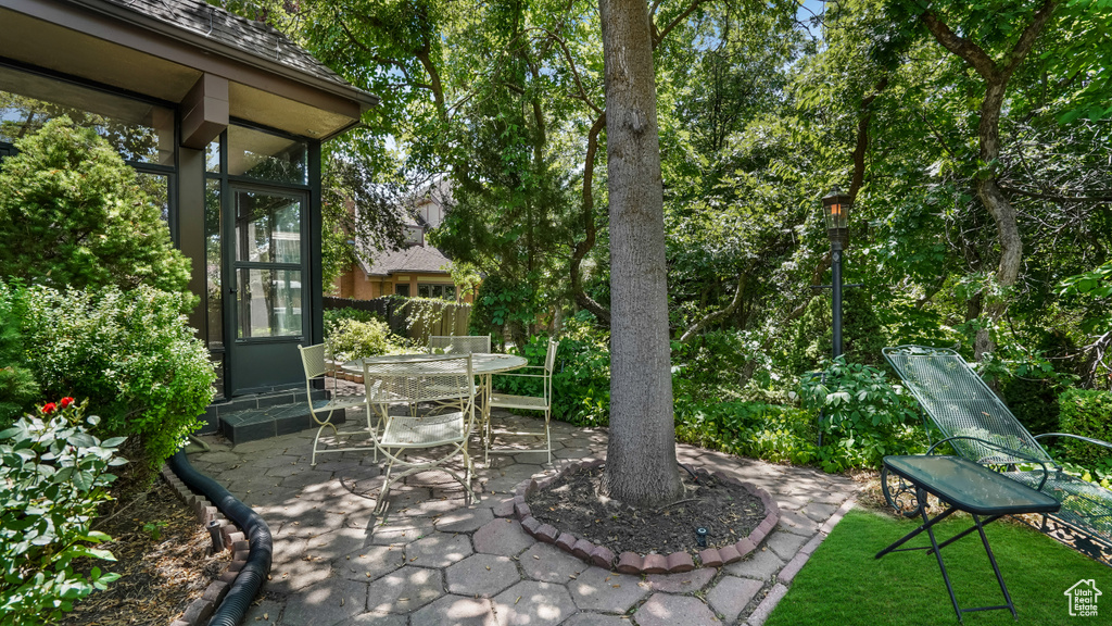 View of patio with outdoor dining space