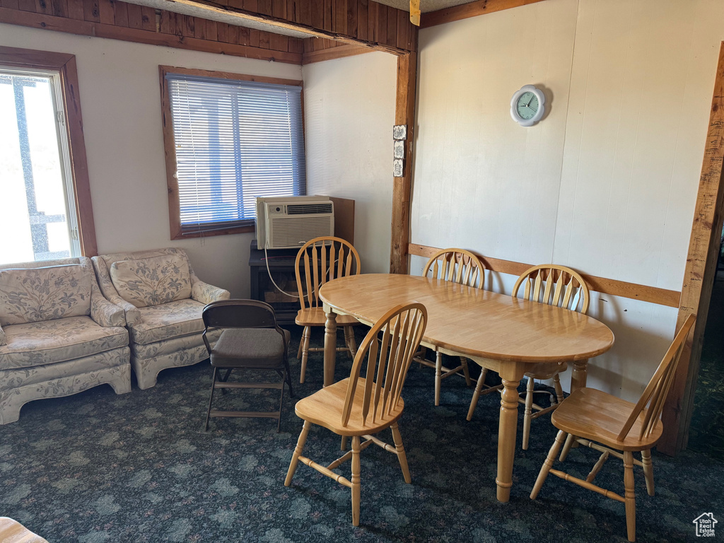 Dining area with a wall mounted air conditioner
