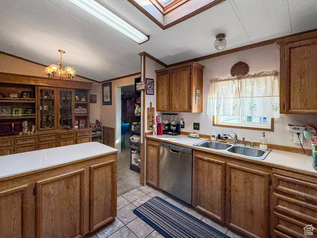 Kitchen with dishwasher, brown cabinets, crown molding, a chandelier, and light countertops