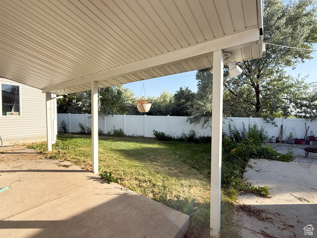 Fenced backyard featuring a patio area