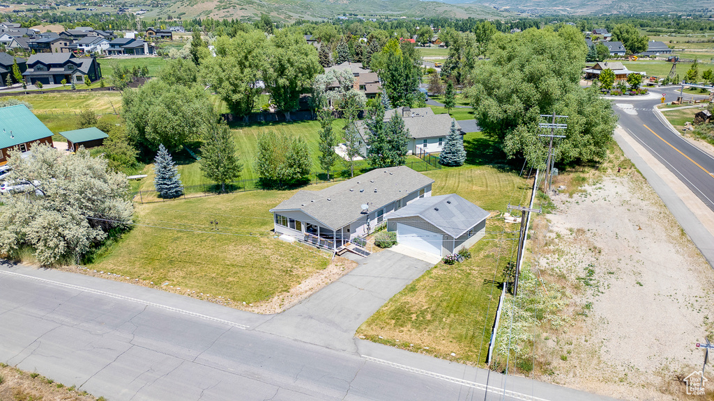 Aerial view of residential area with a mountain backdrop