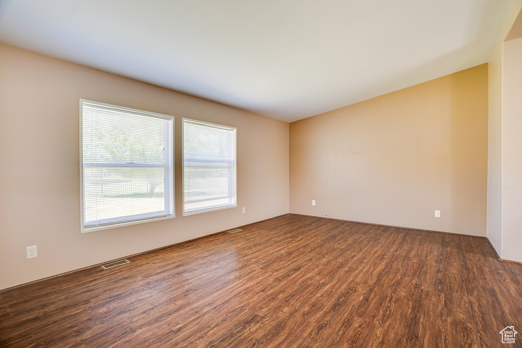 Unfurnished room featuring wood finished floors