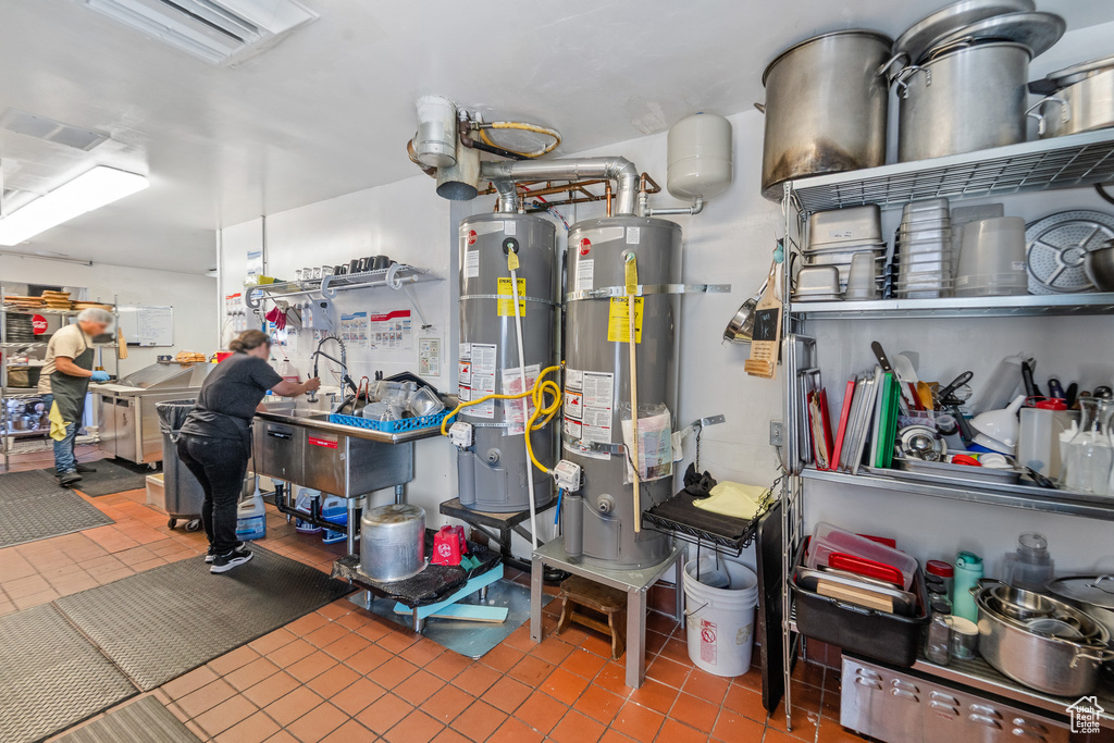 Garage featuring water heater