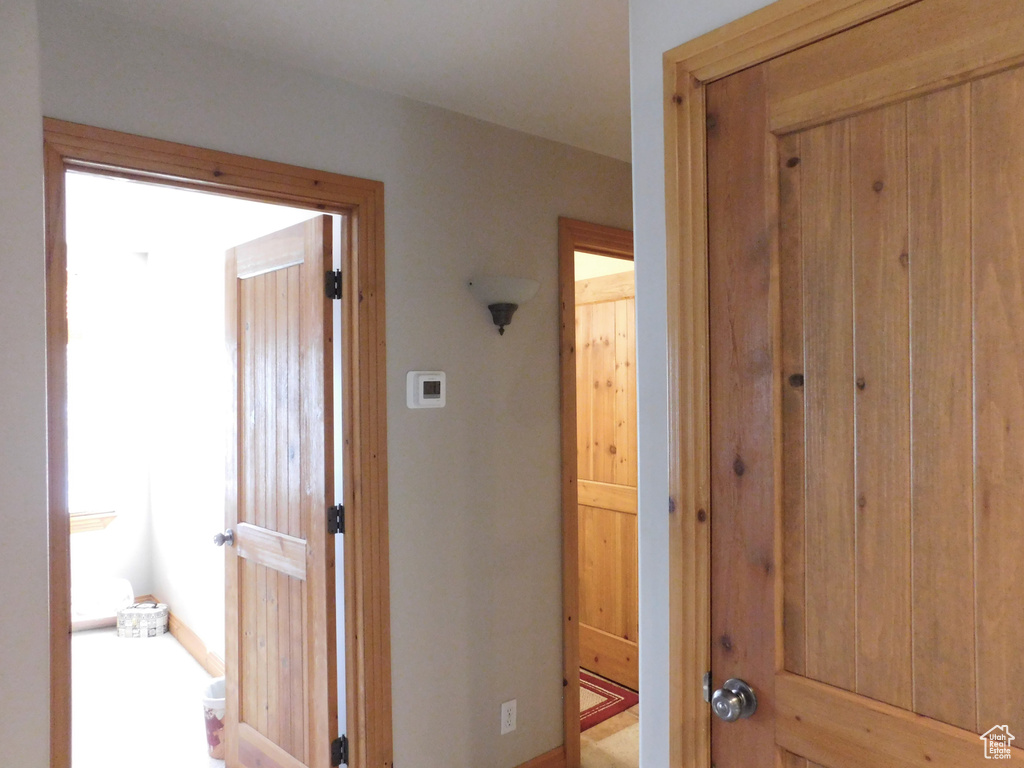 Hall featuring baseboards