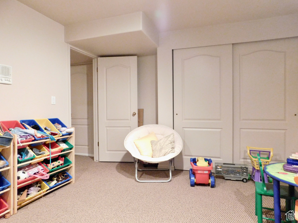 Playroom featuring carpet floors