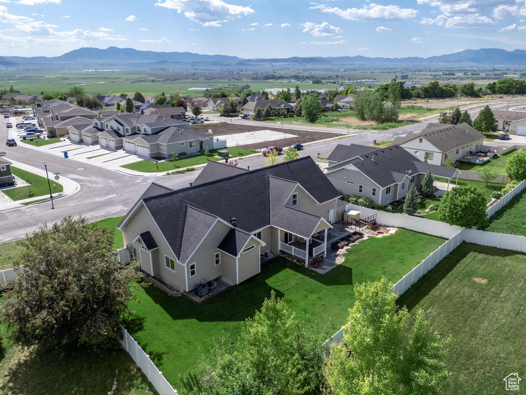Aerial view of residential area with a mountainous background
