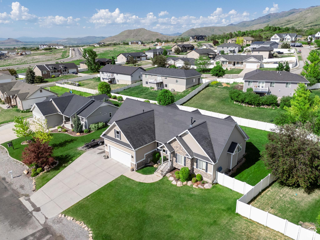 Aerial view of residential area with a mountain backdrop