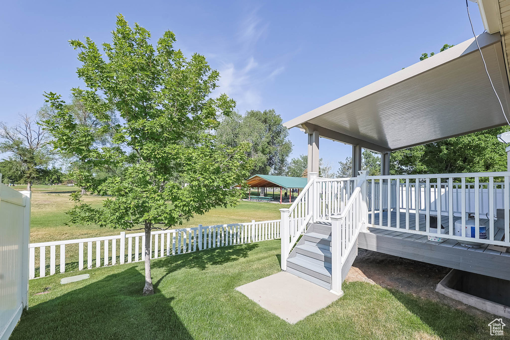 View of yard featuring a wooden deck
