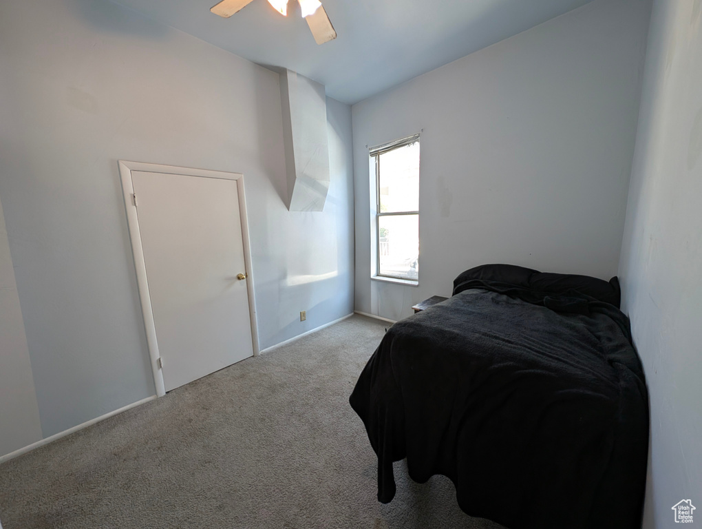 Bedroom with carpet floors and ceiling fan